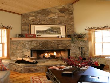 The great roon has a large stone fireplace with convenient gas starter.