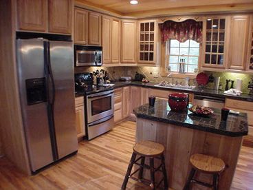 Gourmet kitchem stocked with all the cook\'s tools you\'ll need for memorable family dinners and entertaining.