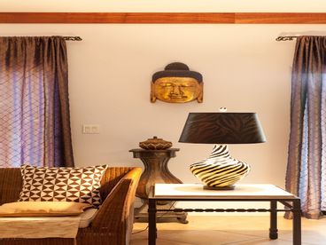 Original artwork and modern Asian decor handpicked by a designer. 