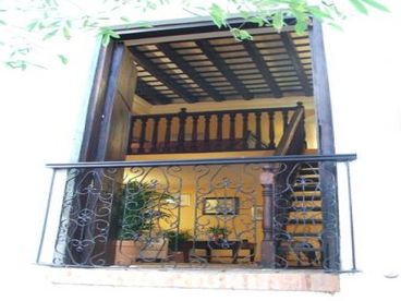 Window view of the 2 levels, Living Room downstair and bedroom upstairs and the Spectacular Staircase.