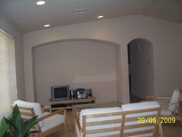 Open living room sits 4