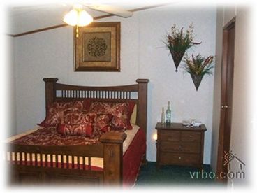 Master Suite, complete with large Master bath, double sinks, garden tub, make up vanity and walk in closet