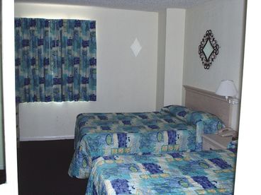 Two double beds and an extra sink.