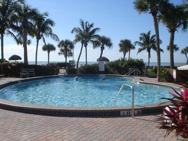 Pool with clubhouse and hot tub.