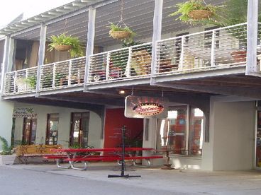Front of the Building, The Sun is located on the second floor