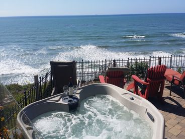 Out with the old, in with the new. On the patio below the deck a new hot tub has been added 