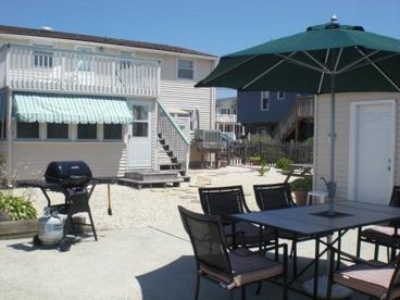 Private back yard with patio and gas grill