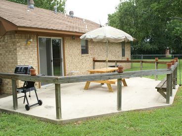  Large patio with grill and picnic table
Back yard fenced