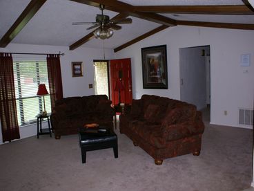 Large ,open, airy living room, with gas fire place