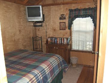 The separate bedroom has a queen-size bed, TV/VCR/DVD, and bathroom (not shown)