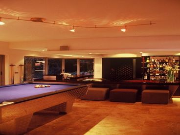 Pool Table and Bar adjacent to natural River