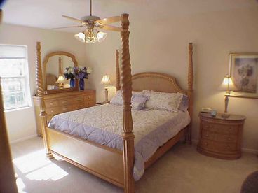 Spacious Master Bedroom with upscale furnitue & T.V. in armoire 