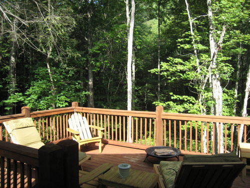 Outdoor deck attached to screen in Porch to enjoy the peaceful sounds of the creek below.  No neighbors to disturb you.
See more photos at bearlake460.shutterfly.com