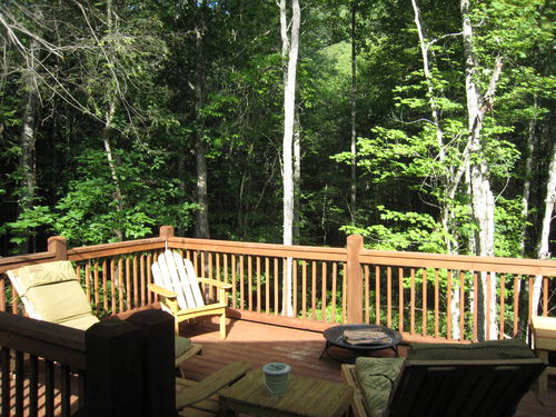 Outdoor deck attached to screen in Porch to enjoy the peaceful sounds of the creek below.  No neighbors to disturb you.
See more photos at bearlake460.shutterfly.com