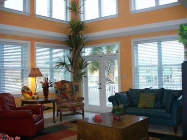 Living Room with Gulf-side views, huge television