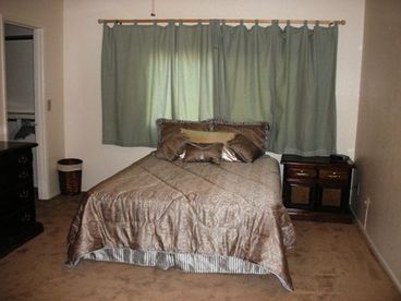 Master bedroom with walk in closet and private bath.