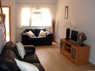 Lounge with leather sofas, flat screen tv, DVD / CD Player.