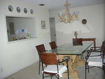 dining room table off living room, near kitchen, seats 8.