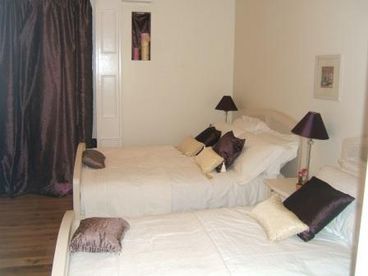Bedroom with double and single bed