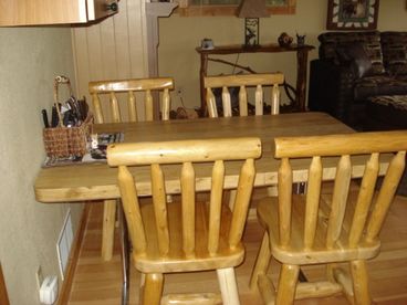 Log chairs in kitchen