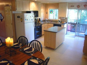 Fully equipped kitchen and dining area.
