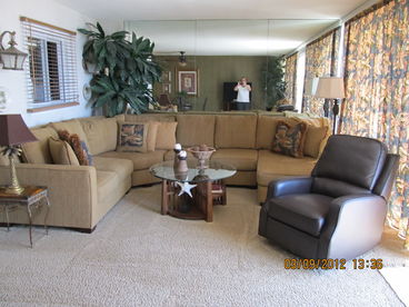 Custom sofa allows seating for everyone!
Livingroom is adjacent the 22\' balcony
that offers fabulous white water views!