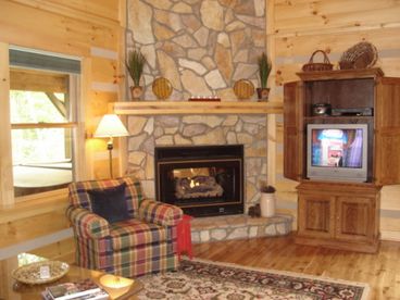 Living area with stone fireplace