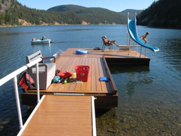 Large Dock with Water Slide and Diving Board.