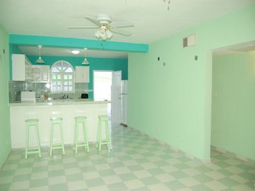 Spacious kitchen and dining room,  build 
in bar.