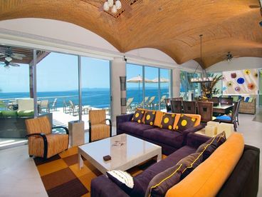 Incredible great room with all glass views to the private infinity pool and ocean.