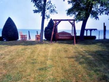 Grassy front yard, looking unto the lake.