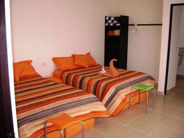 second bedroom with private bath and terrace