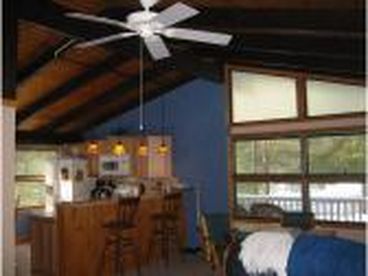 Open concept kitchen/bar and dining area
