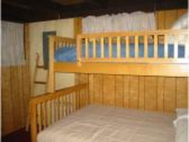 Great room for kids with full size bed on bottom and twin on top