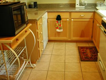 Modern, updated kitchen, gas range, new cabinets and floors in 2007.