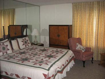 Waterview Masterbedroom.  Balcony off the bedroom facing the water