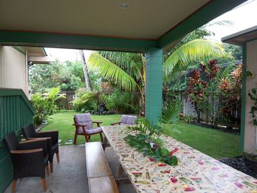 There\'s inside dining and outside dining in the covered patio. The grassy yard is fully fenced.