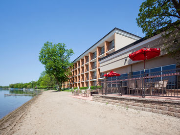 Lakeside Patio from our restaurant and bar. Great sandy beach for family fun.