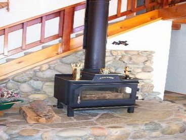 Accommodates roaring fires and has a picture window so you can really see the blaze.  Firewood provided in the garage.