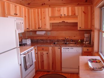 Full kitchen with serving for 10