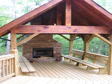 Outdoor fireplace with built in seating