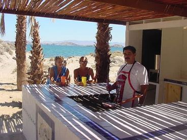 Guests enjoying the charcoal bbq