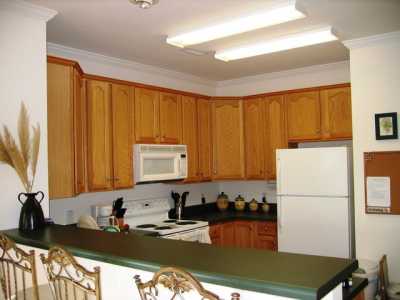 Open kitchen with breakfast bar.