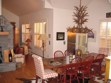 Dining area has fabulous mountain views.  The deck is off the dining area and has a BBQ grill with outdoor furniture to enjoy the summer views.  