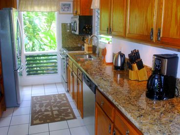 Kitchen with new granite and stainless steel appliances