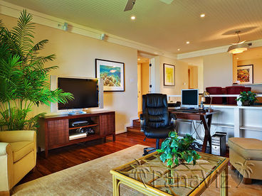 Living room with desk in one of our villas