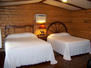 Inside log cabin is cozy and clean