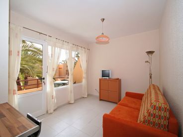 Bright Modern Lounge Area Over Looking The Balcony