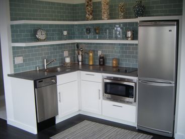fully equipped modern kitchens w/stainless appliances