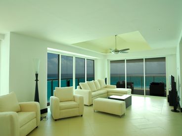 Spacious and Luxurious Floor to Ceiling Sliding Glass Living Area w/Plasma TV 